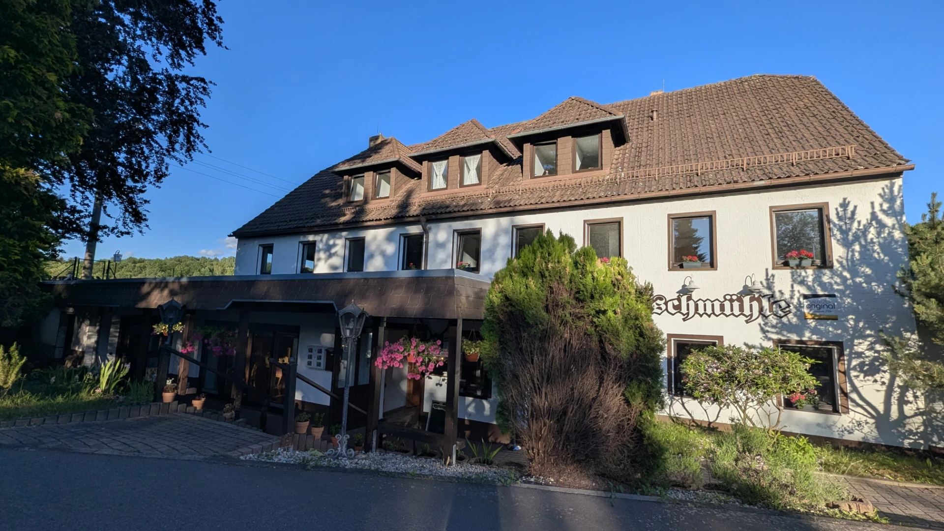 Luftaufnahme der Landpension Buschmühle am See